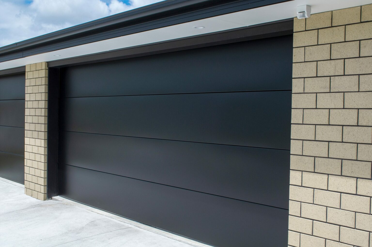 Asgard Premium Sectional Door - Garage doors Waikato, Commercial garage ...