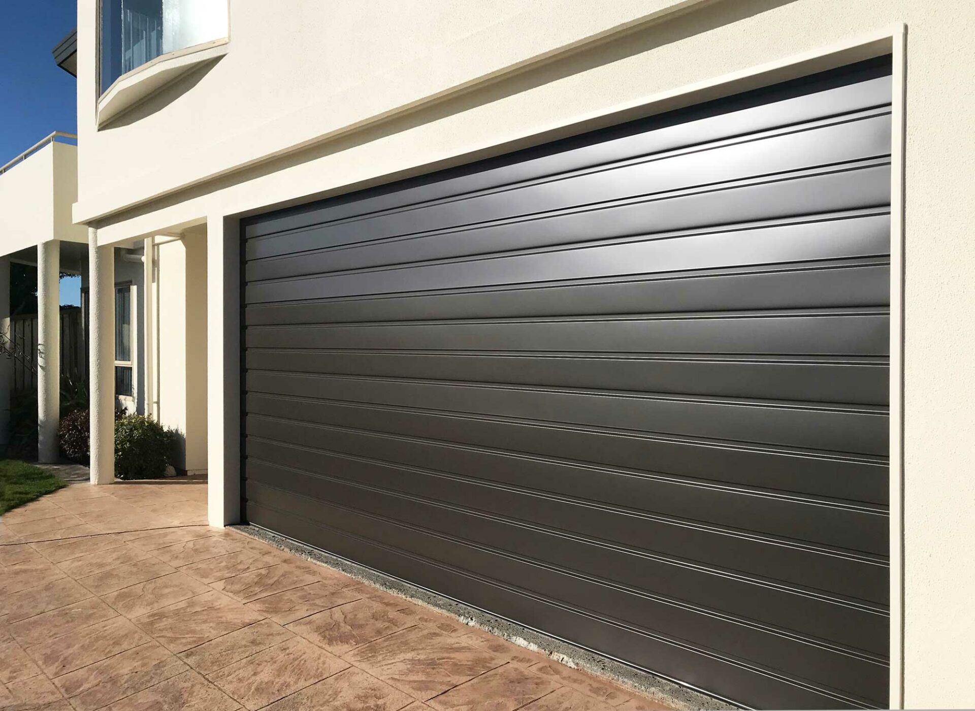 Plateau Sectional Door - Garage doors Waikato, Commercial garage door ...